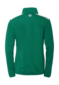 Grøn jakke med høj krave, lange ærmer og en hvid accent på skuldrene. Glat tekstur med et logo på ryggen.