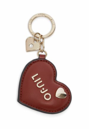Bruine leren sleutelhanger in hartvorm met gouden "LIU JO" letters, klein gouden hartje en gouden ring met een hartbedel en kristaldetail.