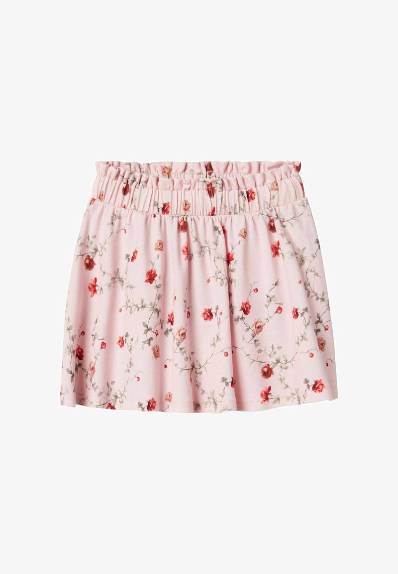 Rosa blommig kjol med elastisk midja, som har ett mönster av röda och beige blommor på ett mjukt, lätt tyg.