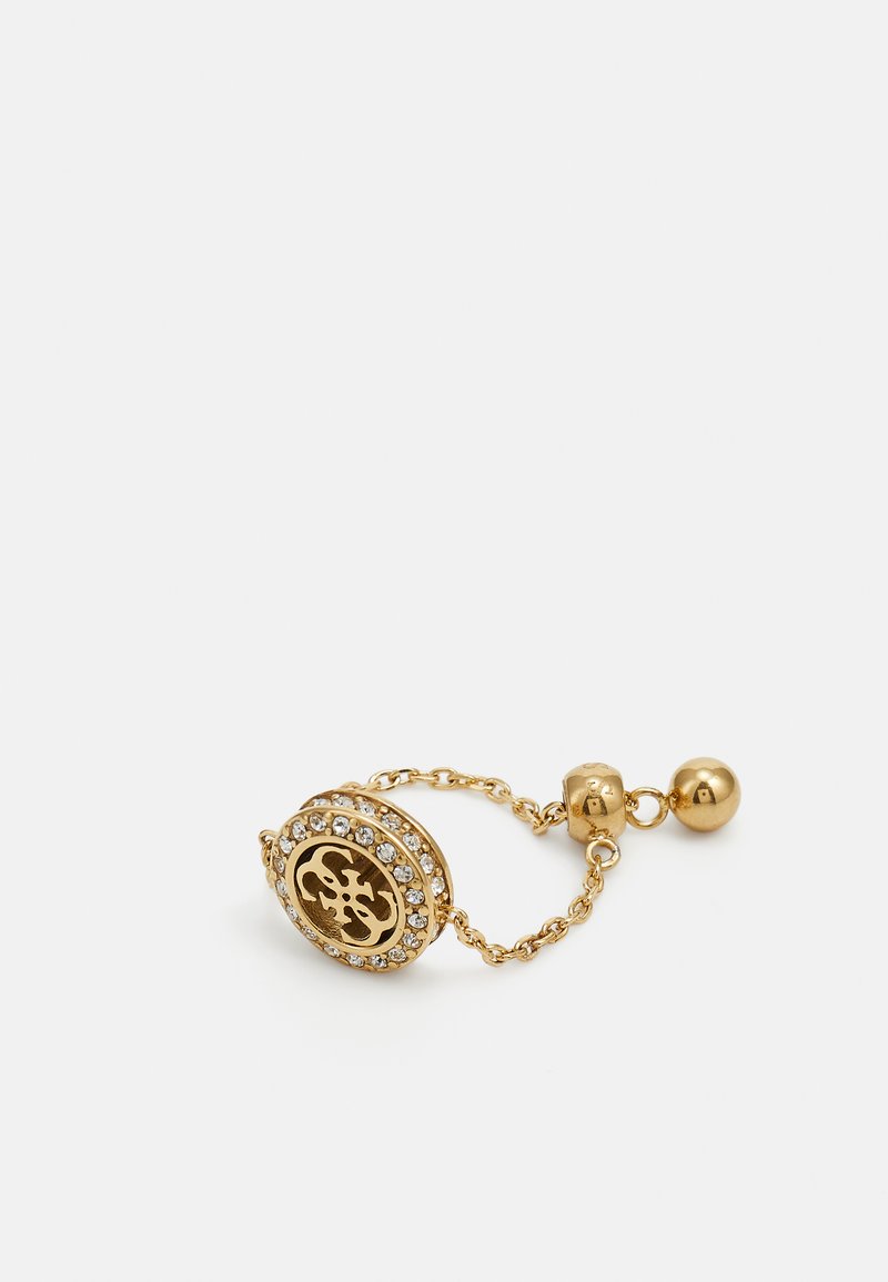 Bracciale tono oro con un ciondolo circolare decorato con cristalli trasparenti e un intricato design ritagliato, collegato da una catena con un accento a sfera.