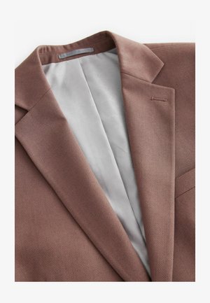 Blazer marrone dalla texture strutturata con colletto a risvolto e fodera interna grigia chiara, caratterizzato da un'asola singola sul rever sinistro.