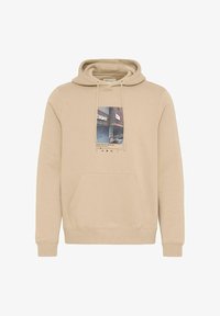 Seleccionado, plaza taupe