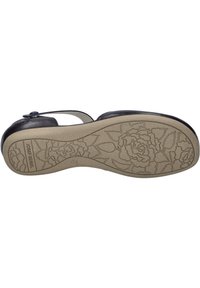 Schwarze Leder-Sandale mit runder Zehenform, verstellbarem Riemen und strukturiertem Gummisohle, die florale Muster und den Markennamen aufweist.