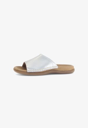 Silver leather slide sandal with an open toe, textured stitching on the upper, and a tan rubber sole for comfort and durability.