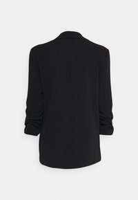 Czarna, długosleeve marynarka o luźnym kroju, z wywiniętym kołnierzykiem oraz marszczeniami przy mankietach. Gładka tekstura materiału.