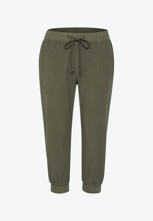 Olivzaļas krāsas sporta bikses ar elastīgu jostu, regulējamu auklu un ribotu aproci pie potītēm. Mīksts materiāls, brīvs piegriezums.