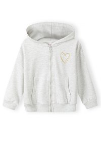 Sudadera con cremallera de color gris claro y textura suave, que presenta un pequeño diseño de corazón dorado en el lado izquierdo del pecho. Incluye bolsillos frontales y capucha.