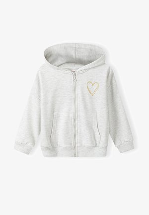 Svetlo šedá mikina na zips s mäkkou textúrou, s malým zlatým srdiečkom na ľavej hrudi. Obsahuje predné vrecká a kapucňu.
