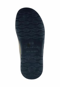 Black rubber sole with wavy tread pattern, featuring embossed brand logo and "Made in Italy" text, designed for traction and durability.