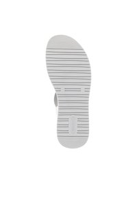Gray rubber shoe sole with a textured surface, featuring horizontal grooves and a circular logo in the center. Size imprint visible.