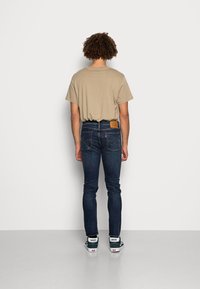 Levi's® 510™ SKINNY - Calças de ganga de corte skinny - ama dark vintage