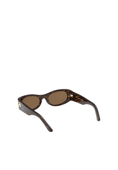 Bruine schildpadzonnebril met ovale lenzen, met een decoratieve accent op de poot en bruine getinte lenzen. Glad afwerking.