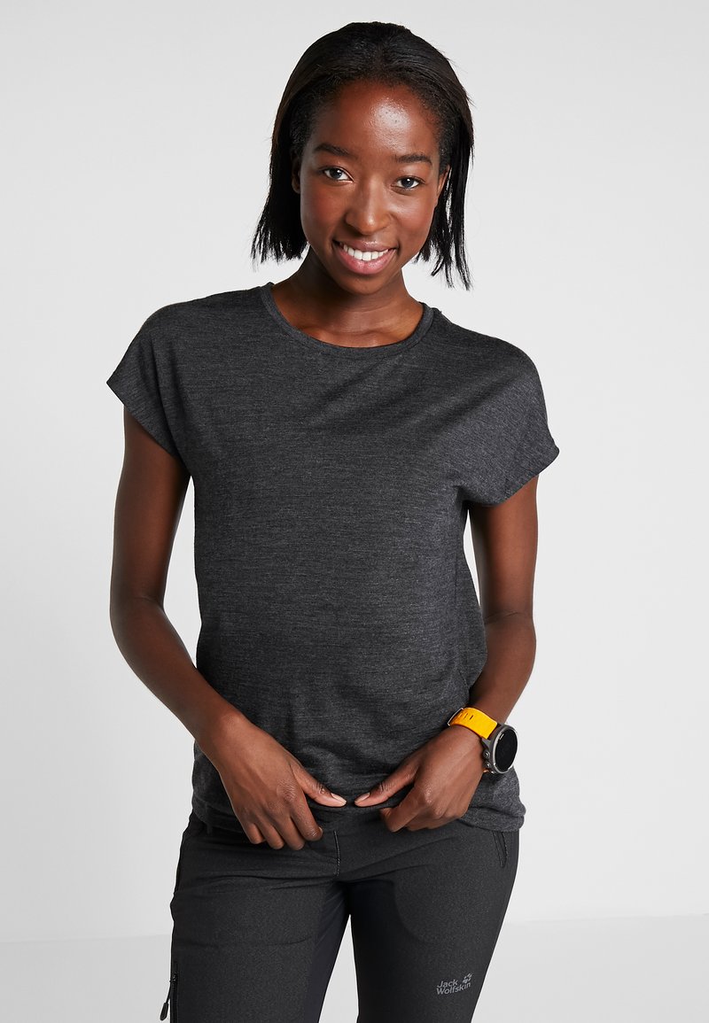 Short-sleeve, dark gray t-shirt with a round neckline, soft texture, and relaxed fit, paired with black pants and a yellow wristwatch.