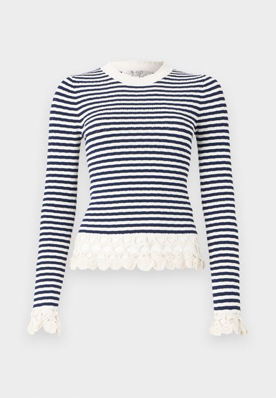 Pulover lung cu manșon cu dungi bleumarin și albe, având un model texturat și un tiv și accente de dantelă ondulată la manșon. Confectionat dintr-un material elastic.