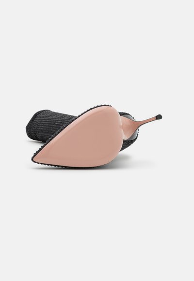 Black fabric heeled shoe with a pink glossy sole, featuring a pointed toe and a slender, metallic heel. Textured upper with a decorative edge.