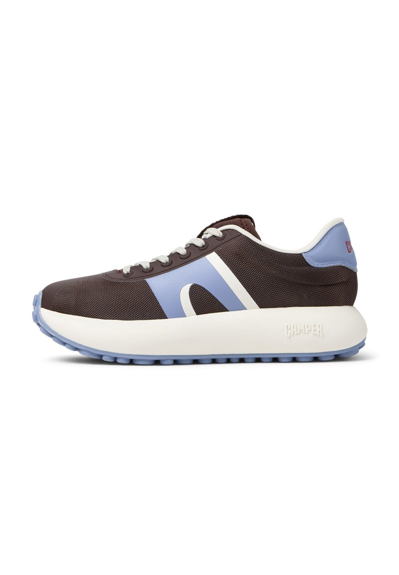 A brown and blue sneaker with a white sole, featuring a curved design and contrasting stripes, positioned against a white background.