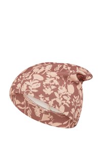 Soft fabric baby hat with muted pink and beige floral print, folded edge, and stitched seam detail.