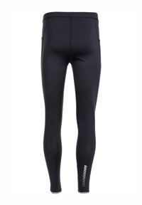 Svarta träningsleggings med en slät textur, åtsittande design och reflekterande detaljer längs den nedre benet. Har sidofickor.