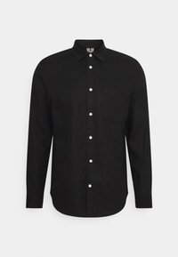 Černá dlouhá halenka s dlouhými rukávy vyrobená z lnu, s límcem na knoflíky, přední kapsou a bílými knoflíky podél zapínání. Hladká textura.