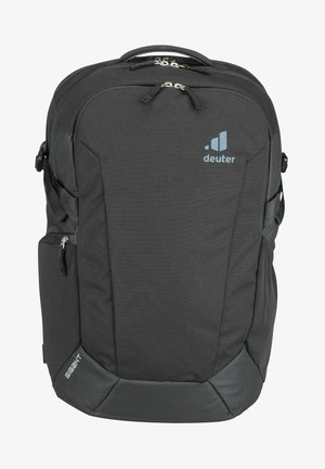 Zaino in tessuto grigio con spalline regolabili, tasche con cerniera e una finitura testurizzata. Presenta un logo del marchio e un fondo rinforzato.