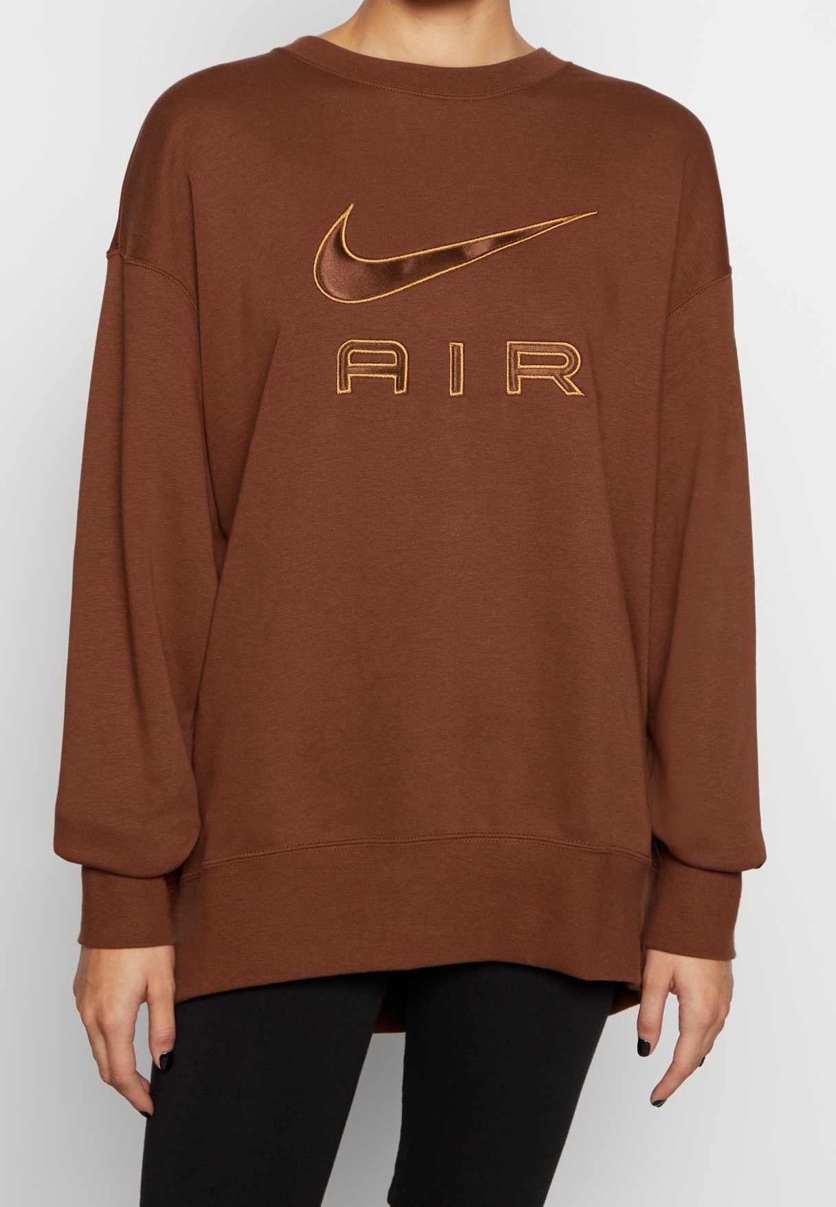 brown oversized nike sweatshirt