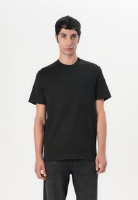 Lacoste Marškinėliai su spaudiniu - black
