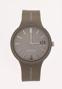 Reloj de silicona gris con un diseño minimalista. Presenta marcadores de horas plateados, una esfera suave y una caja redonda con una correa texturizada.