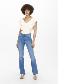 ONLY ONLWAUW LIFE FLARE  - Flared jeans - light medium blue
