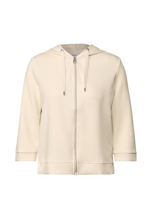Cream-colored hooded jacket with a full zipper, made of soft fabric, featuring a relaxed fit, long sleeves, and drawstring accents at the hood.