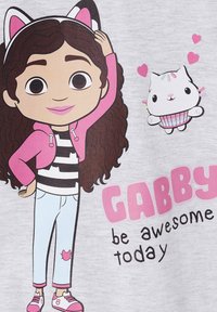 Gray fabric featuring a cartoon character with brown curly hair, pink hoodie, striped shirt, blue jeans, and pink shoes, alongside a cat with hearts.