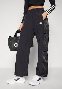 adidas Sportswear CARGO PANT - Hlače - black