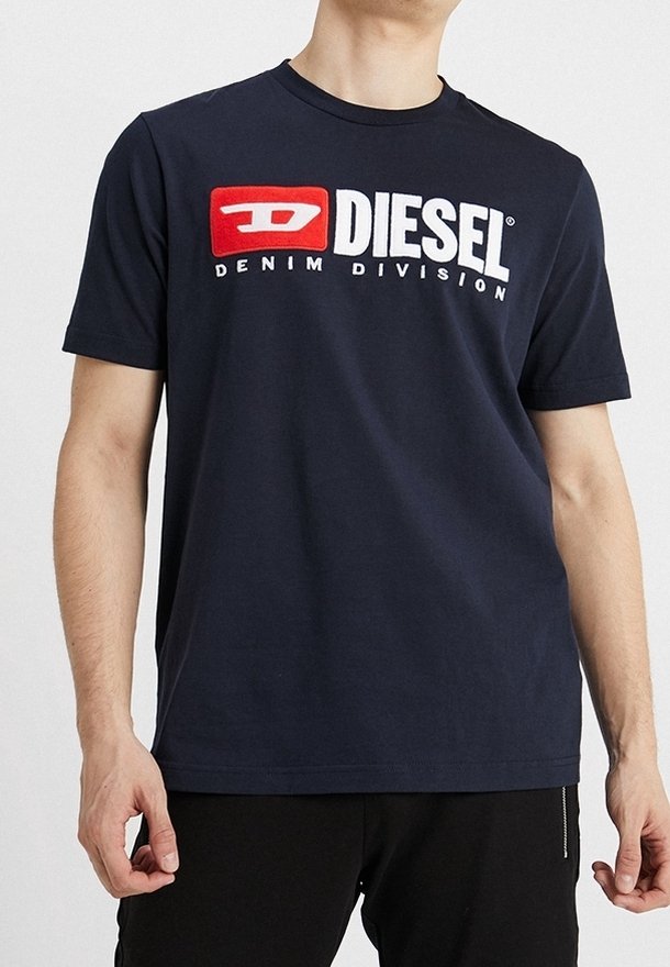 Navy blue cotton t-shirt with round neckline, featuring a bold red and white "DIESEL DENIM DIVISION" logo on the front. Short sleeves.