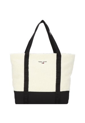 Torba typu tote z białym teksturowanym wierzchem i czarną podstawą, czarne uchwyty i małe logo "Tommy Jeans" na środku z przodu.