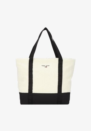 Torba typu tote z białym teksturowanym wierzchem i czarną podstawą, czarne uchwyty i małe logo "Tommy Jeans" na środku z przodu.