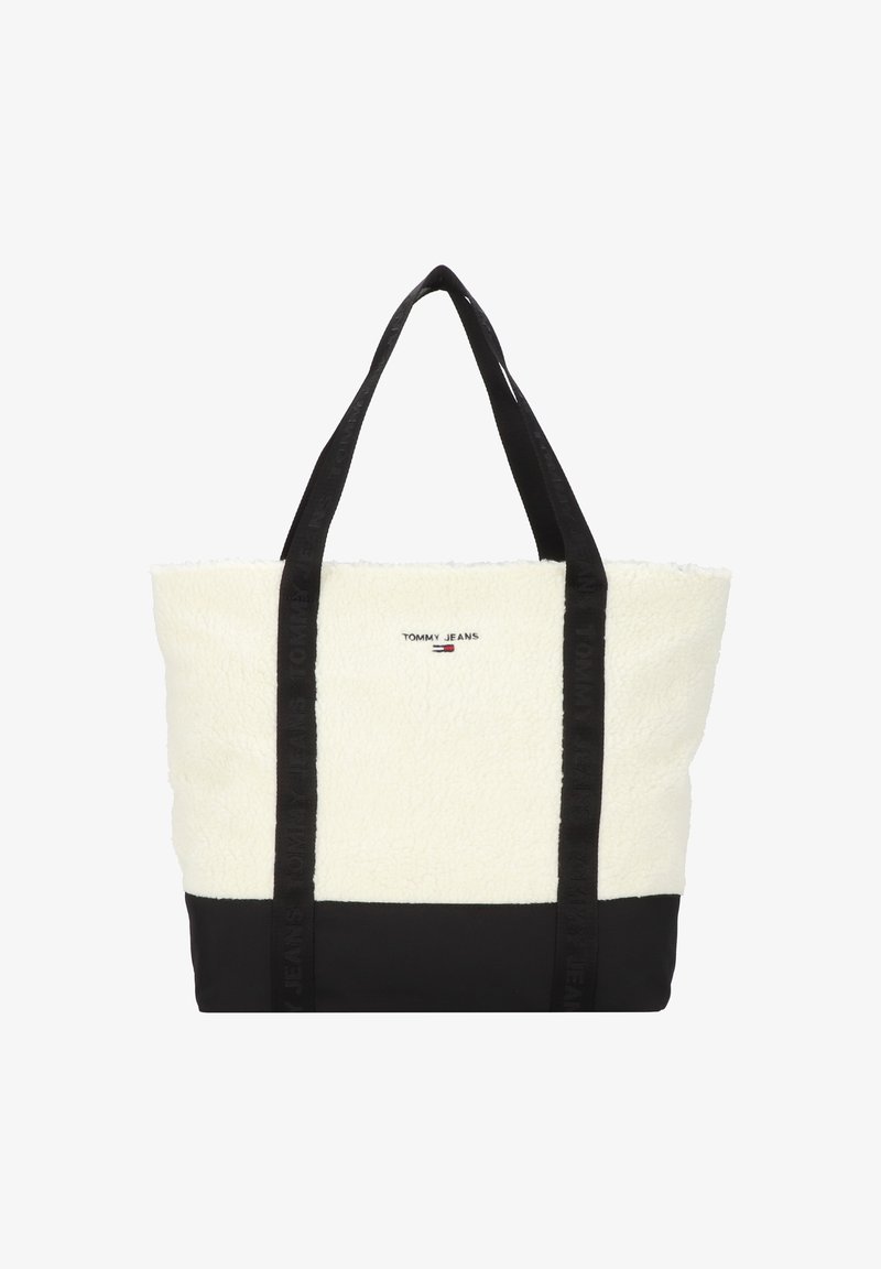 Sac fourre-tout avec partie supérieure texturée blanche et base noire, anses noires et petit logo "Tommy Jeans" centré sur le devant.