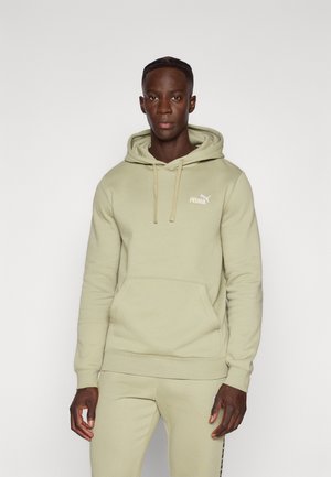 Light green hoodie with drawstrings, front pocket, ribbed cuffs, and a small white Puma logo on the chest. Super soft fabric texture.