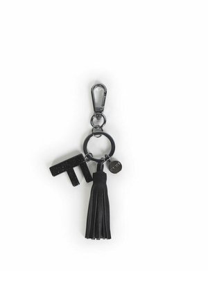 Portachiavi nero con anello metallico rotondo, dettaglio a nappa e accenti di lettere texturizzati. Presenta un gancio per il fissaggio e un ciondolo rotondo.