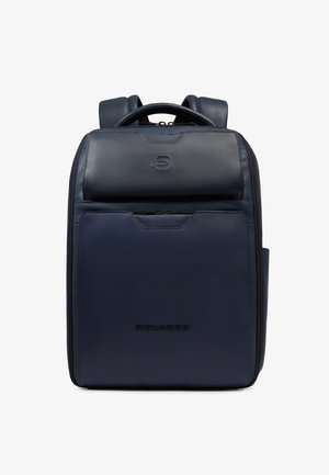 Navy blue leather backpack with front zippered pockets, padded shoulder straps, and top handle.