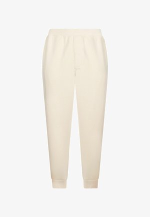 Helle beige Jogginghosen aus weichem Stoff. Mit elastischem Bund, Seitentaschen und gerippten Bündchen an den Knöcheln.