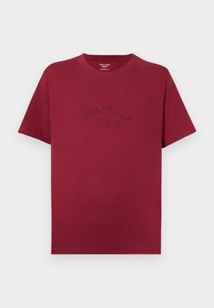 Mörkröd T-shirt med kort ärm i bomull. Har broderad "ORIGINALS"-text i en något mörkare nyans på bröstet. Standard passform.
