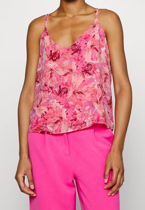 Blomstret camisole i pink og mauve, med V-udskæring og tynde stropper. Letvægtsstof med en blød, flydende tekstur og subtil glans.