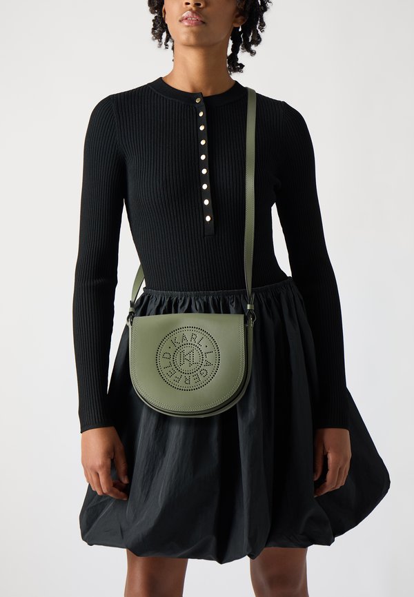 CIRCLE SADDLE PERFORATED - Cross body bag