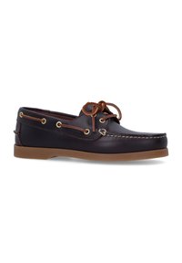 Scarpa da barca in pelle blu navy con dettagli marroni, punta rotonda, lacci e suola beige. Presenta occhielli in metallo e dettagli di cucitura a contrasto.