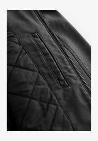 Wybrany, black