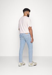 Levi's® Plus 512™ SLIM TAPER - Calças de ganga justas - corfu lucky day