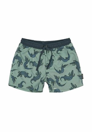 Green swim shorts with blue alligator pattern, elastic waistband, drawstring, and smooth texture.
