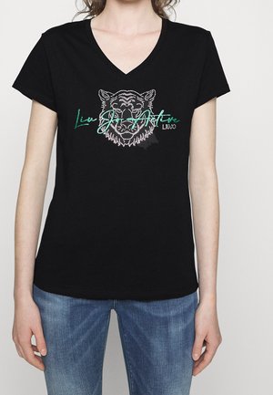 Schwarzes Baumwoll-T-Shirt mit V-Ausschnitt, mit einem Tiger-Graphic und "Live Jet Active" in grünen Strasssteinen. Kurze Ärmel, lässige Passform.