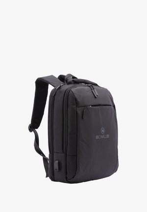Black backpack made of durable fabric, featuring padded straps, two zippered compartments, and a subtle logo on the front.