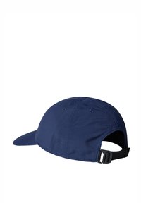 Navy blue cap made of lightweight fabric, featuring a curved brim, adjustable strap at the back, and ventilation eyelets.