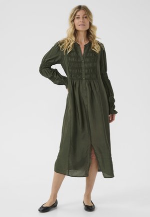 Long olive green dress with gathered detailing, button front, and balloon sleeves; lightweight, flowing fabric with a subtle sheen.